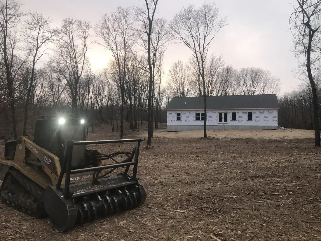 Lot cleared around a new home build.